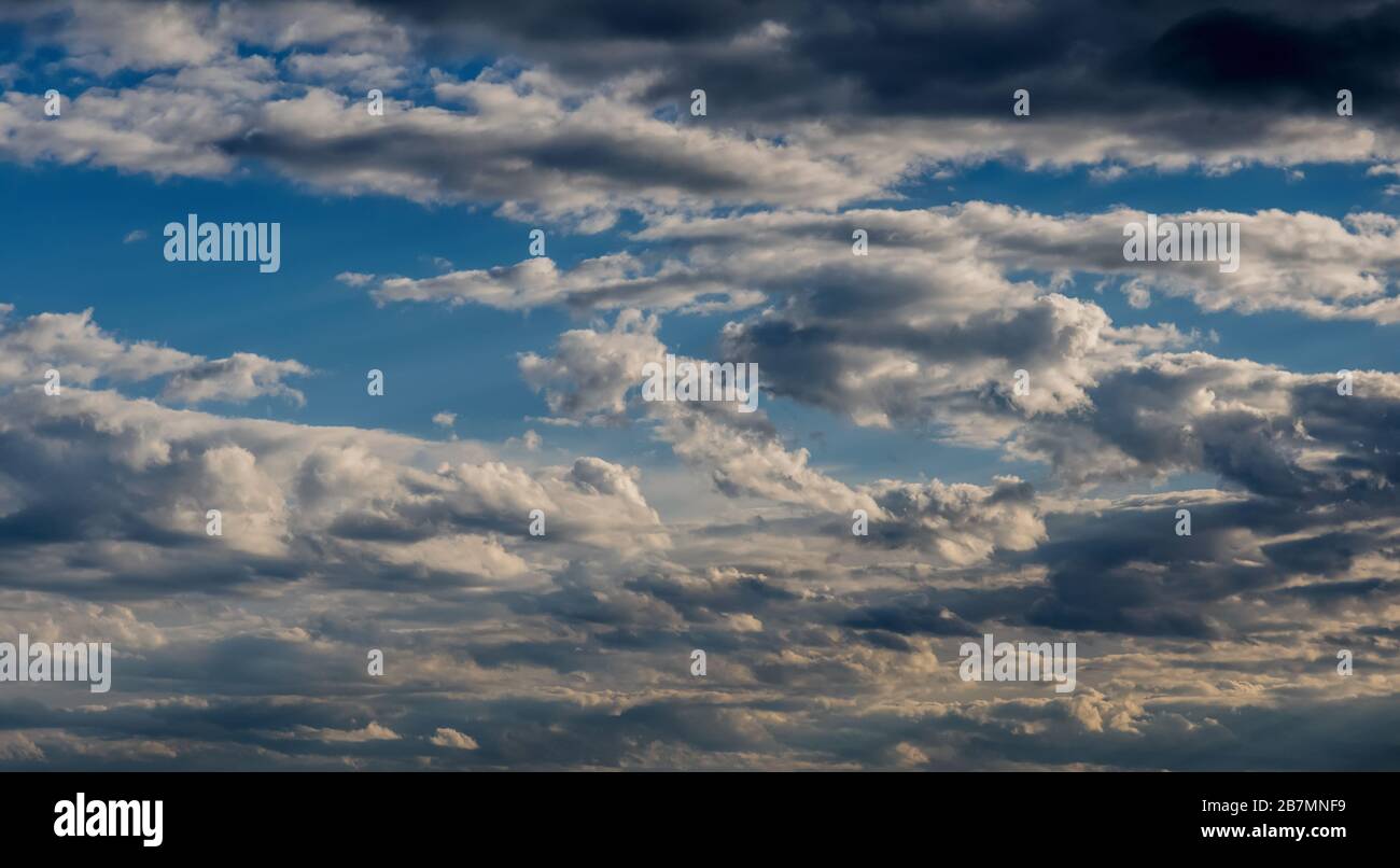 Blue sky with dark clouds. Nature background Stock Photo - Alamy
