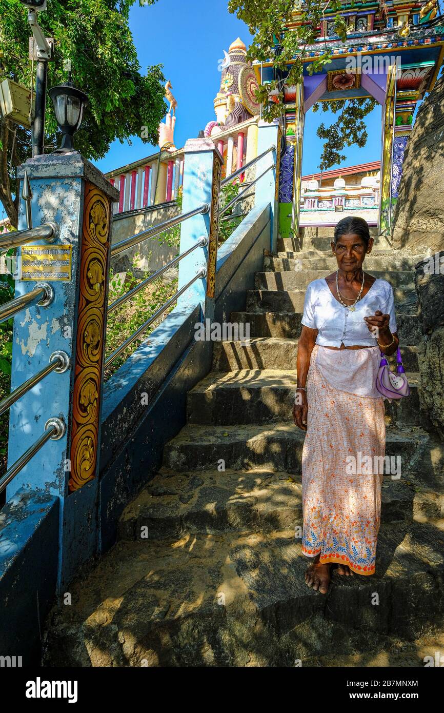 Trincomalee, Sri Lanka - February 2020: Woman visiting the Kandasamy Kovil Hidu temple on February 16, 2020 in Trincomalee, Sri Lanka. Stock Photo