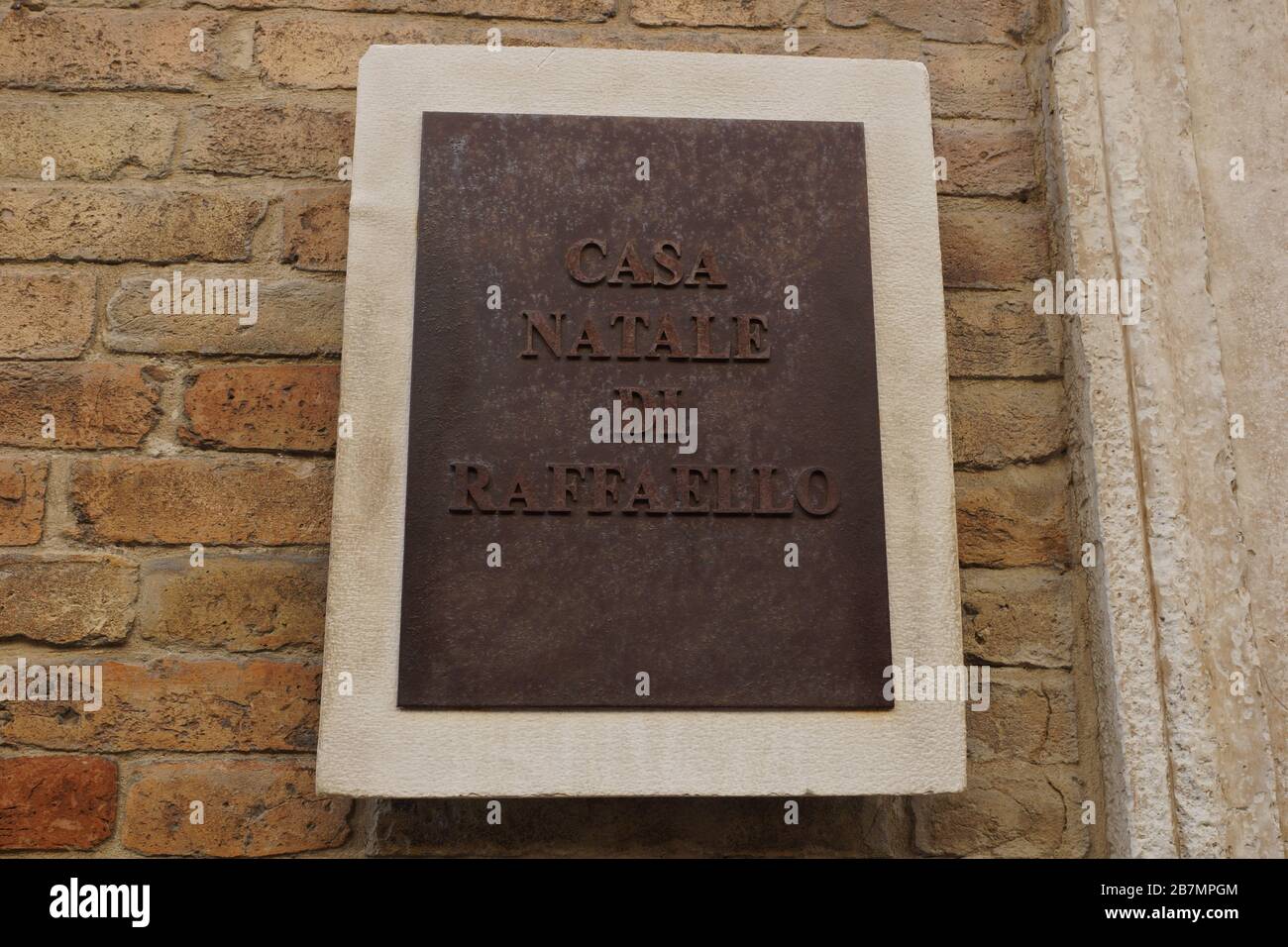 Nameplate. The house-museum of the great Italian painter and architect of the High Renaissance Raphael (Raffaello Santi)  in Urbino. Marche, Italy. Stock Photo