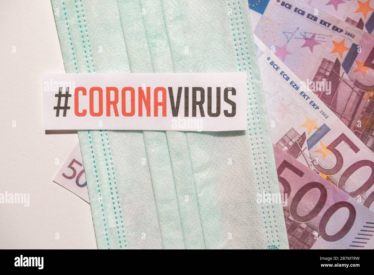 Corona virus impact on European economy concept, banknotes with medical mask Stock Photo