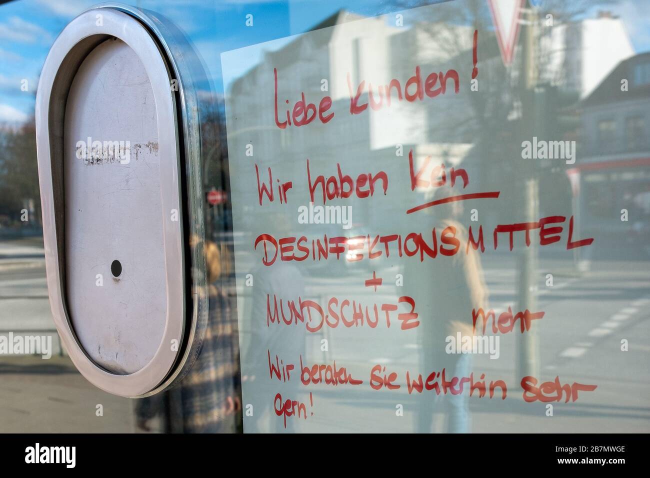 A pharmacy put up a notice that mouth masks and disinfectant is sold out in Hamburg, Germany, on March 15, 2020 Stock Photo