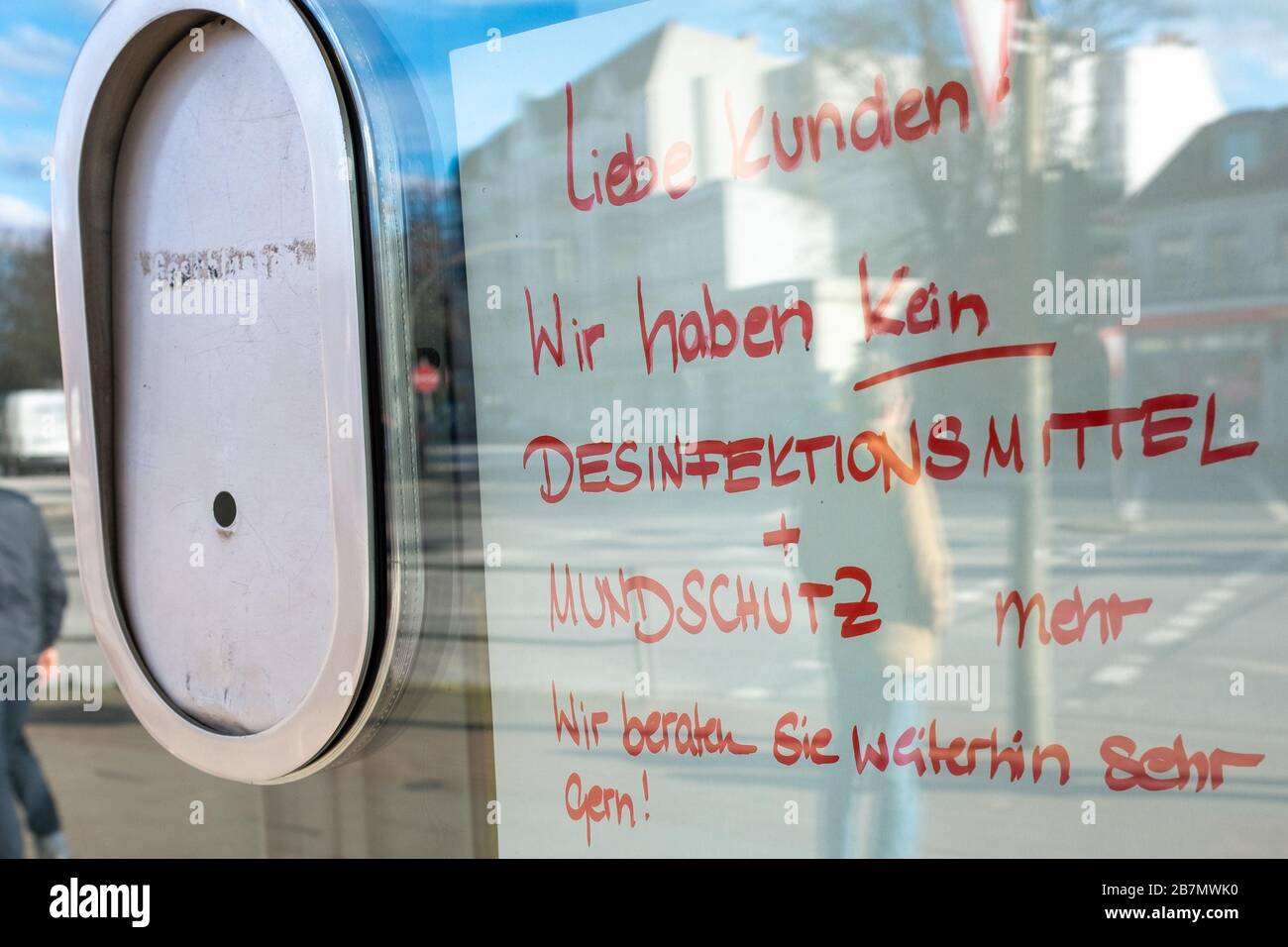 A pharmacy put up a notice that mouth masks and disinfectant is sold out in Hamburg, Germany, on March 15, 2020 Stock Photo