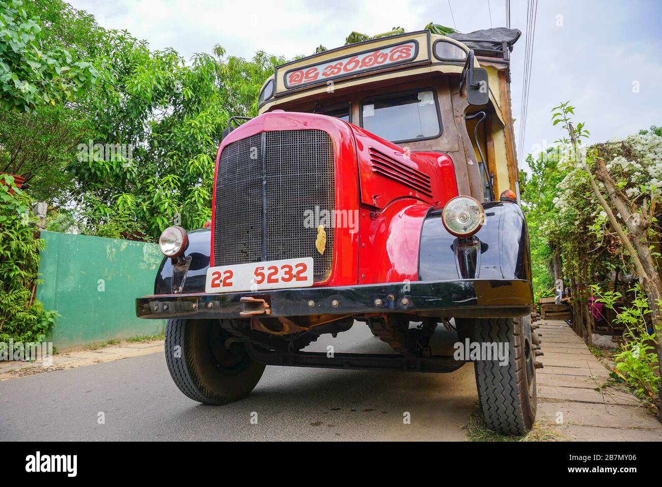 A typical truck carrying fruit in Sri Lanka, bearing typical Sinhala