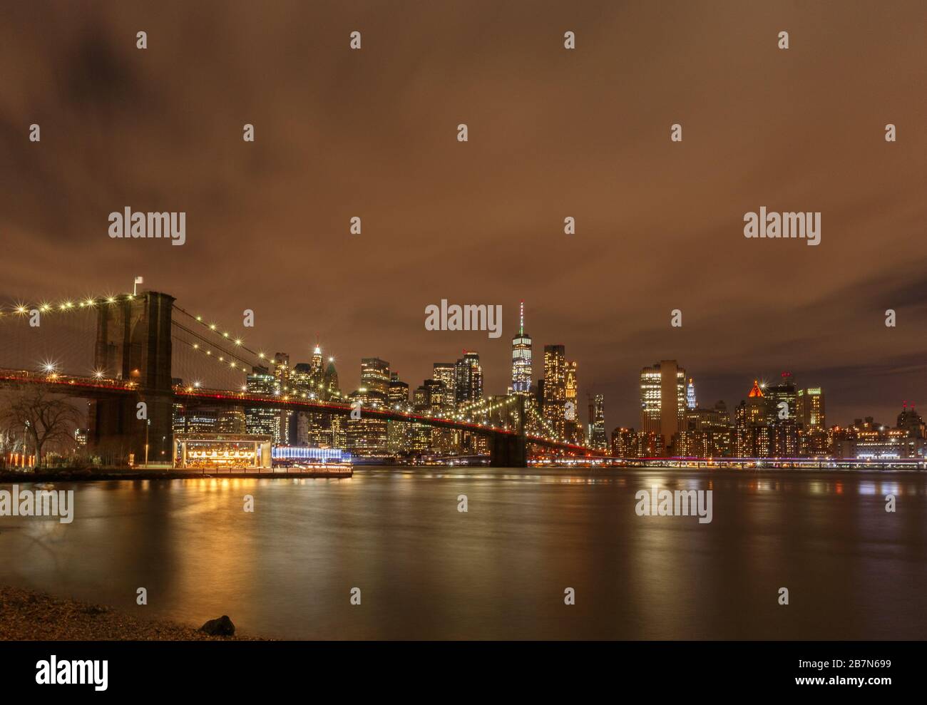 Brooklyn Bridge and Lower Manhattan at night. View from Dumbo Park, New York City, USA Stock Photo