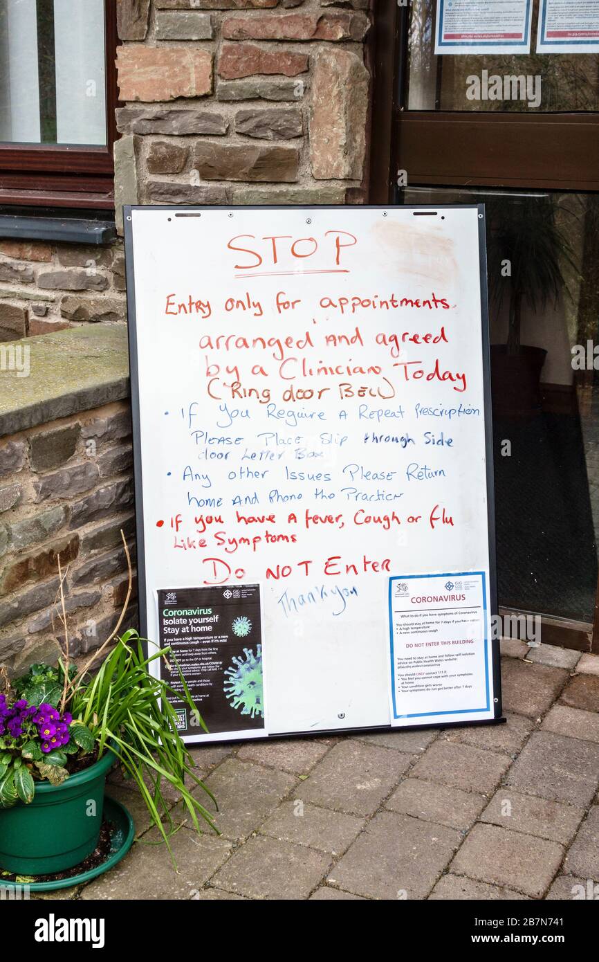 Warning notice outside the doctor&rsquo;s surgery stating that entry is 