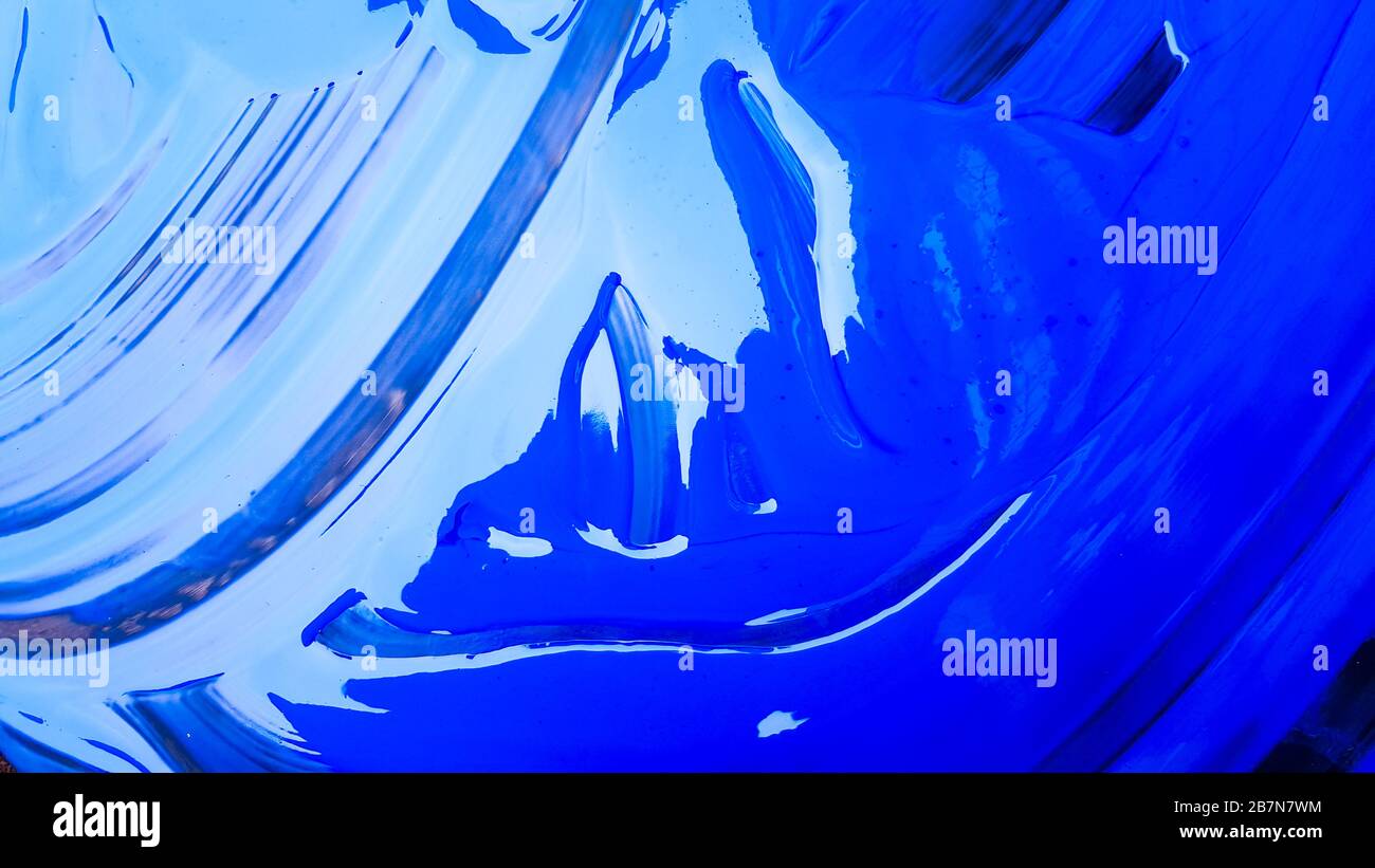 Abstract Background Of Spilled Blue Paint With Buckets On A Black Background Blue Paint Is Pouring On A Black Background Use It For An Artist Or Stock Photo Alamy