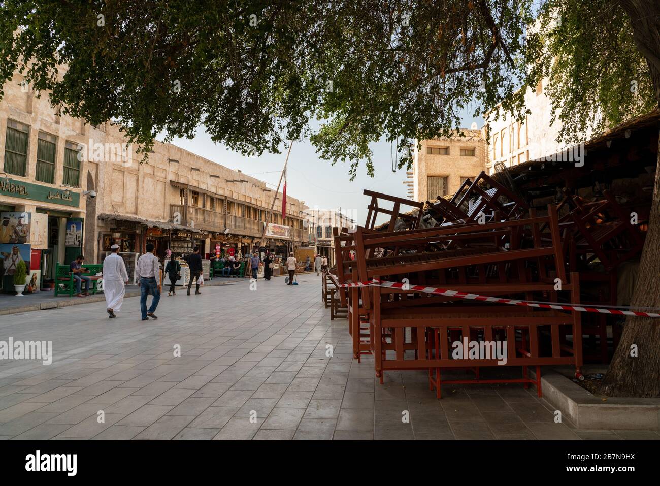 Souq Waqif, one of Doha's tourism landmarks, usually full with people, now has few visitors. Qatar has implemented a series of measures aimed at containing the outbreak of the novel coronavirus in the country. Measures include closing of schools and universities, a temporary ban on inbound flights and banning dinning at restaurants and cafes. An economic and financial package will provide incentives amounting to 75 billion Qatari riyals ($23bn) to help support the private business sector during the outbreak. Stock Photo