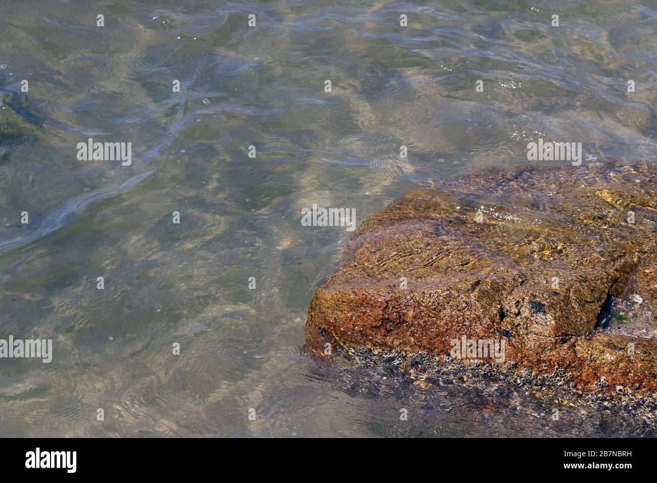 Crystal clear sea water and superb clean, See rocks on the bottom of ...