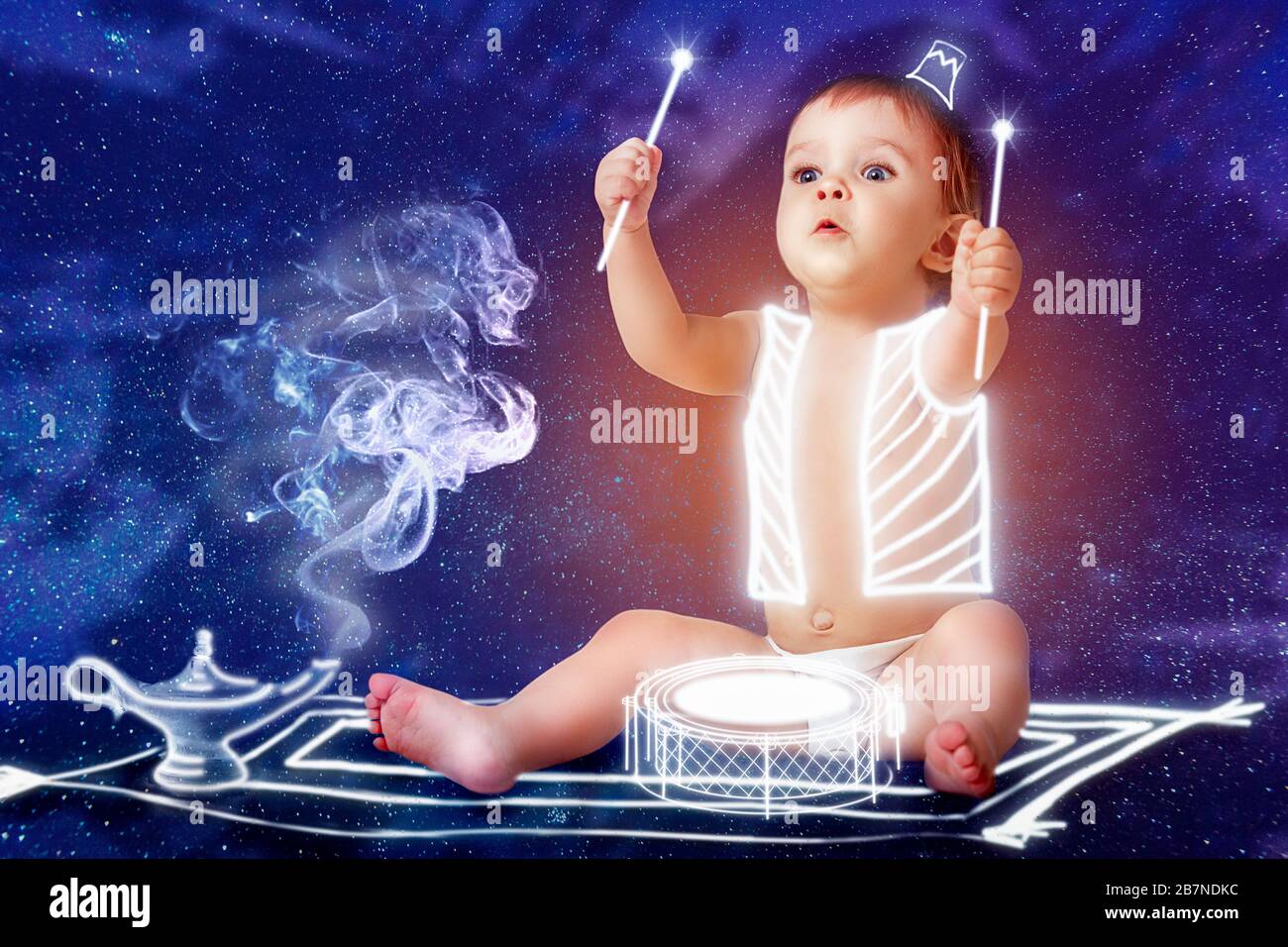 Funny little toddler wizard plays the drums while sitting on an imaginary carpet airplane with a magic lamp flying in the middle of the night sky. Dre Stock Photo