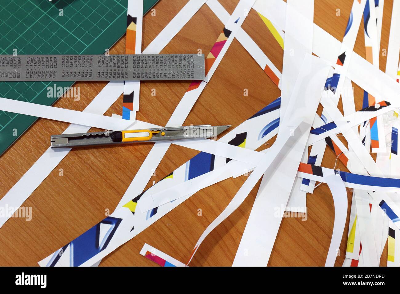 A pile garbage of scrap paper is cut with a knife cutter, Destruction