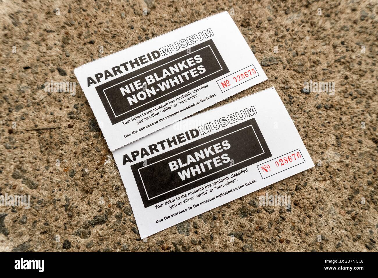 Johannesburg, South Africa - May 25, 2019: Two different tickets to Apartheid Museum, one for Whites and second for Non-Whites Stock Photo