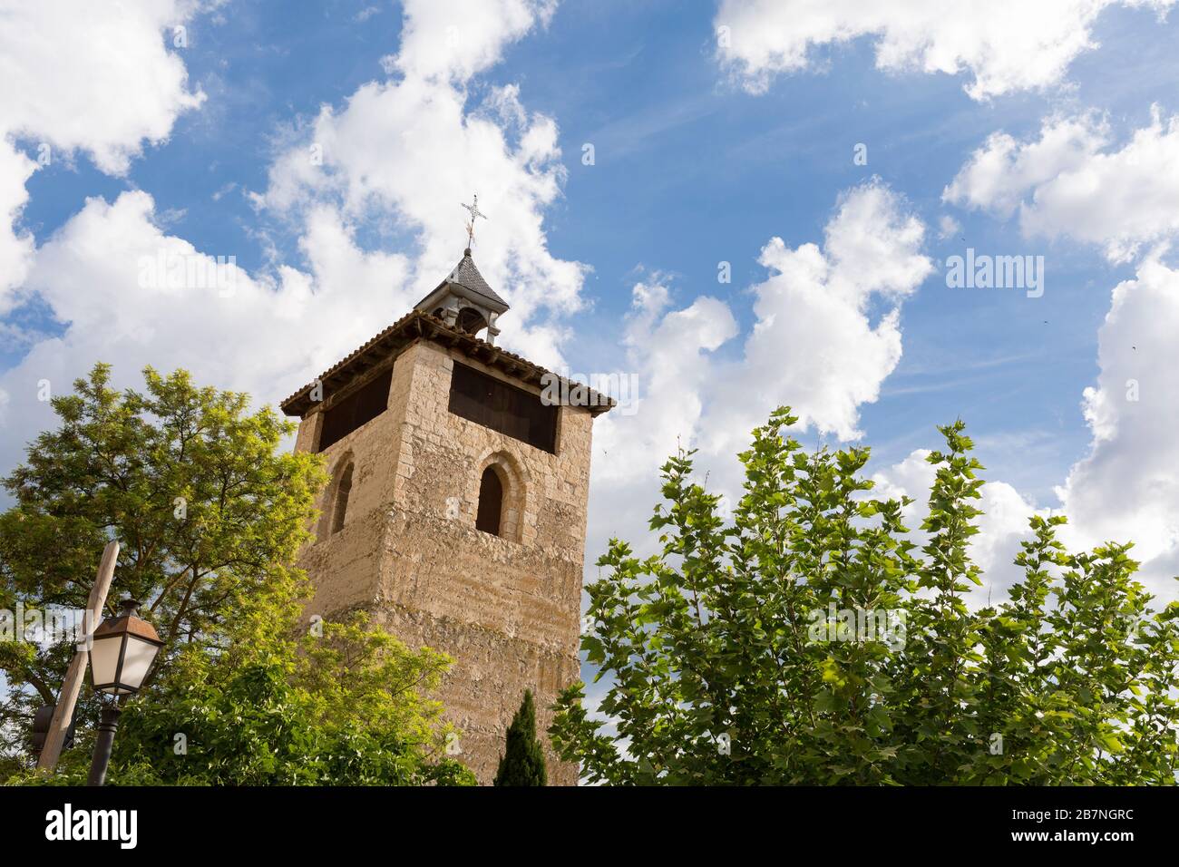 Torre del Reloj in the village of Peñafiel, Castile and León, Spain. The landmark tower was built in 1086 as part of the Romanesque Iglesia de San Est Stock Photo