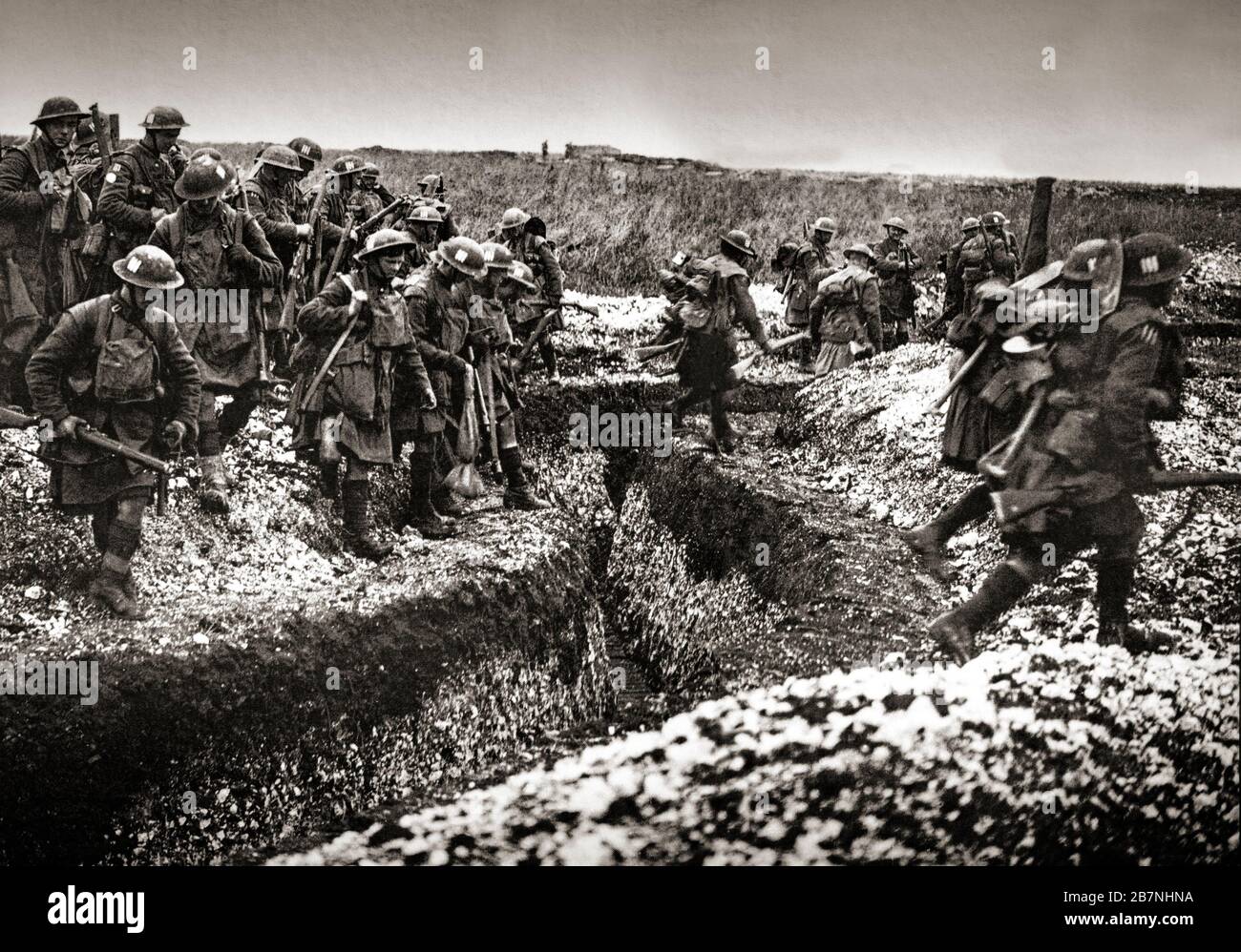 Kilted soldiers of the Gordon Highlanders crossing a trench on the first day of the Battle of Cambrai, 1917. Cambrai, in the département of Nord, was an important supply point for the German Hindenburg Line and capture of the town and the nearby Bourlon Ridge would threaten the rear of the German line to the north. Stock Photo