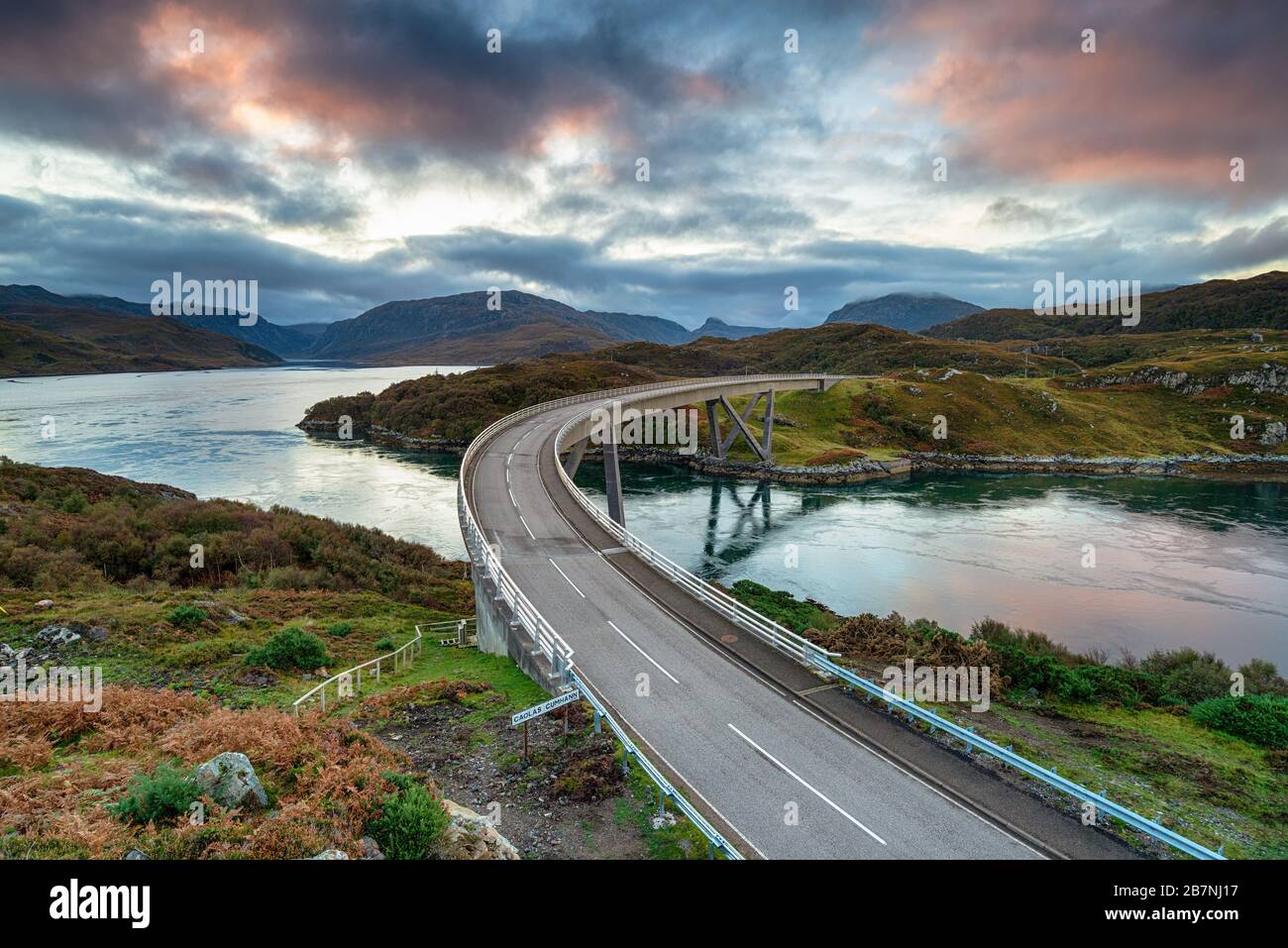 Dawn at Kylesku Bridge in the Highlands of Scotland and a lanmark on the North Coast 500 scenic driving route Stock Photo