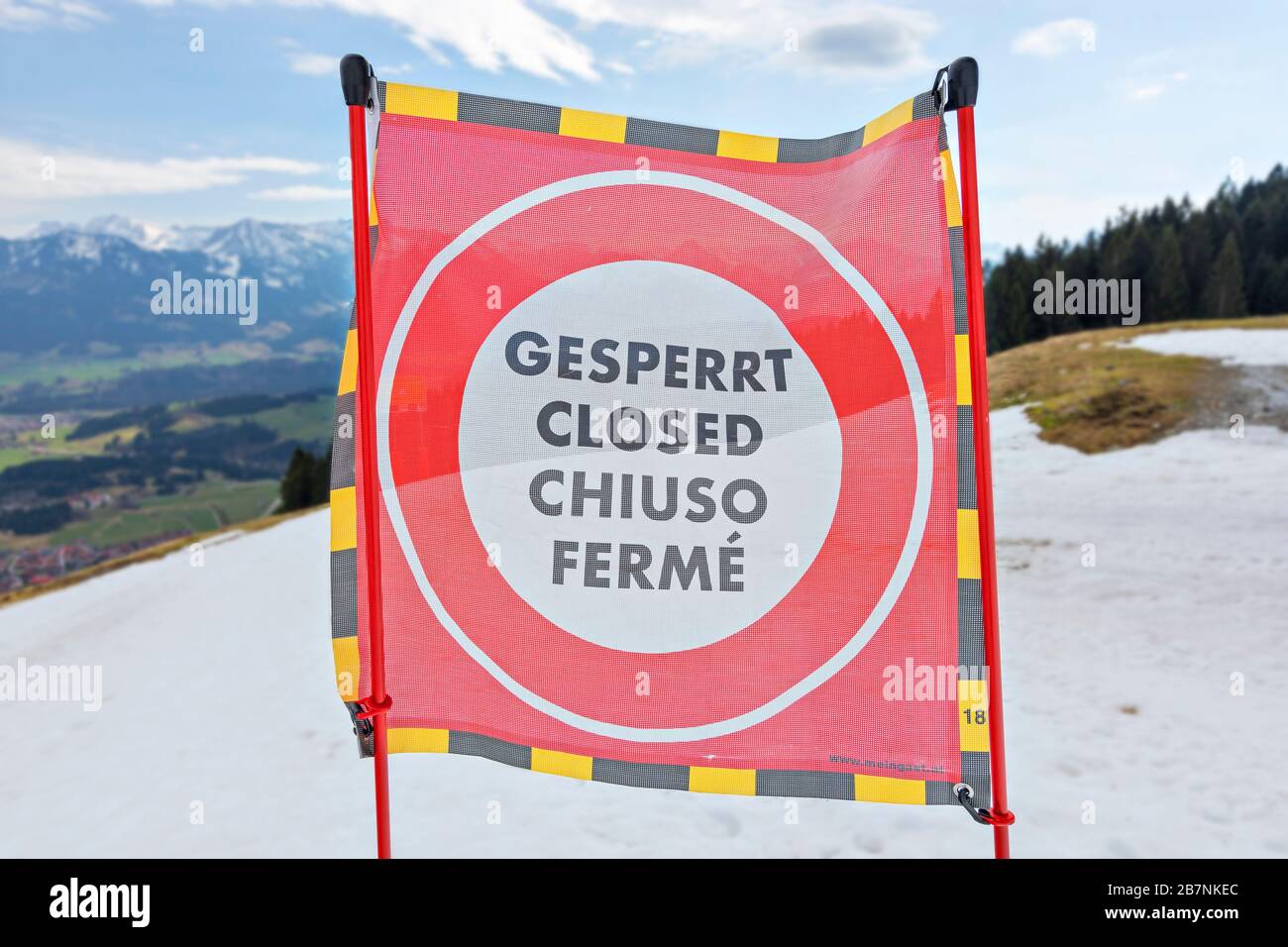 Closed sign in the abandoned ski area of Bolsterlang near Oberstdorf because of Corona virus epidemic. Allgäu Alps, Bavaria, Germany. Selective focus Stock Photo