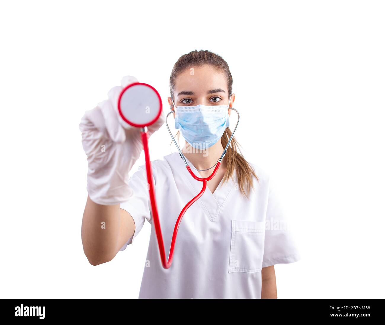 Young female doctor holding a stethoscope in a front view shot Stock Photo