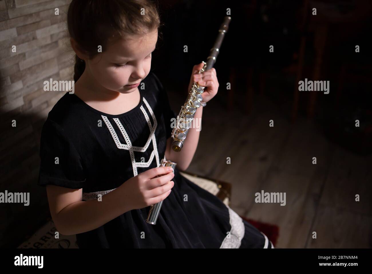 Girl Playing Flute High Resolution Stock Photography and Images Alamy