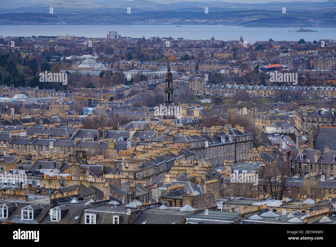 Edinburgh rooftops view looking over  the city to the Firth of Forth and Fife. Stock Photo