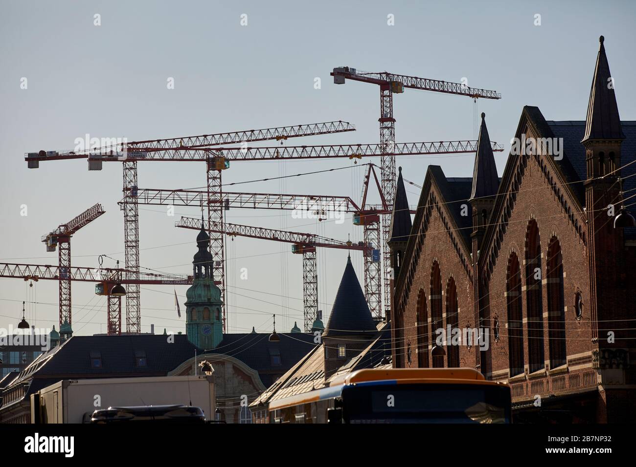 Copenhagen, Denmark’s capital, Tower cranes on the skyline next to central Station Stock Photo