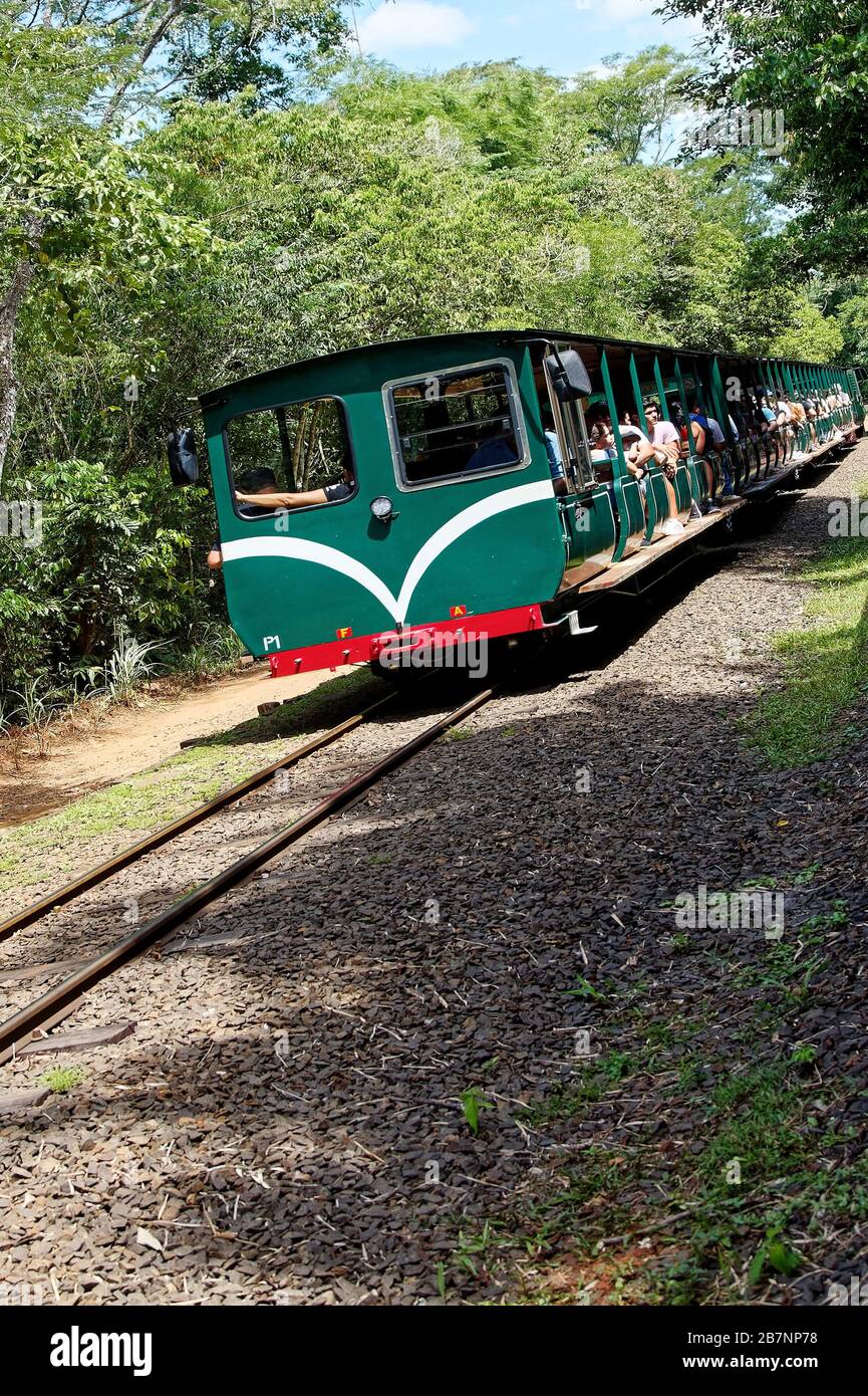 open-air train; people; crowded, transportation, moving, Iguassu Falls National Park; South America; Argentina; summer Stock Photo