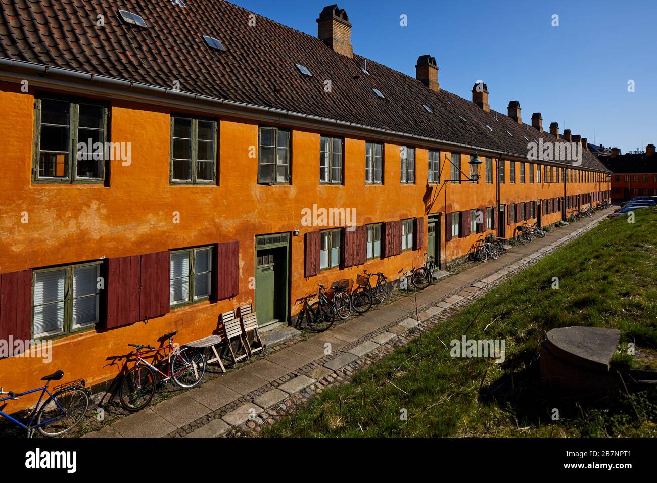 Copenhagen, Denmark Nyboder historic yellow row house district of former Naval barracks for the Royal Danish Navy Stock Photo
