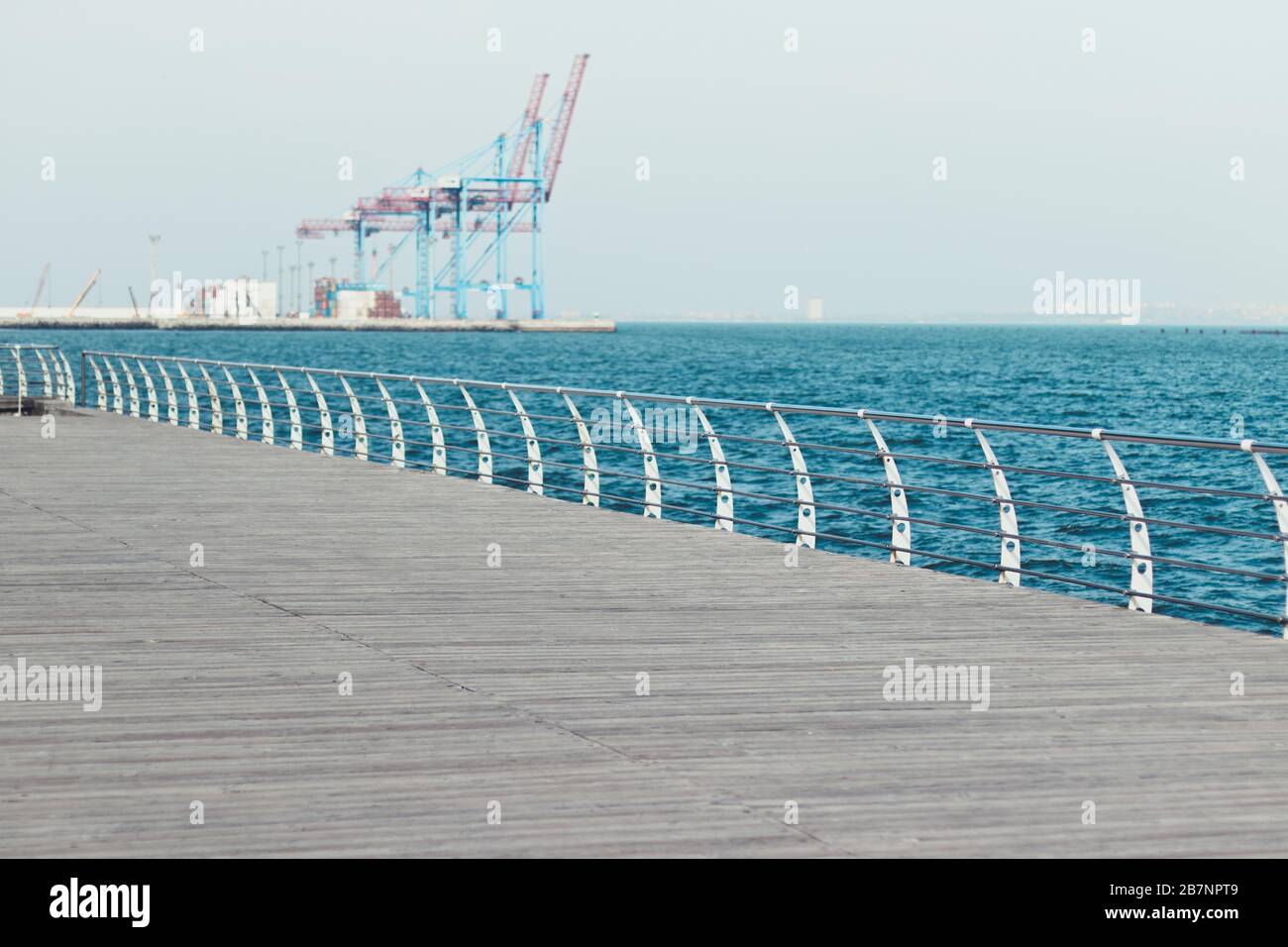 Panorama of a wooden pier in the city of Odessa. Langeron on a summer day on Black Sea. Mediterranean Sea. Embankment by the sea. Travel concept Stock Photo