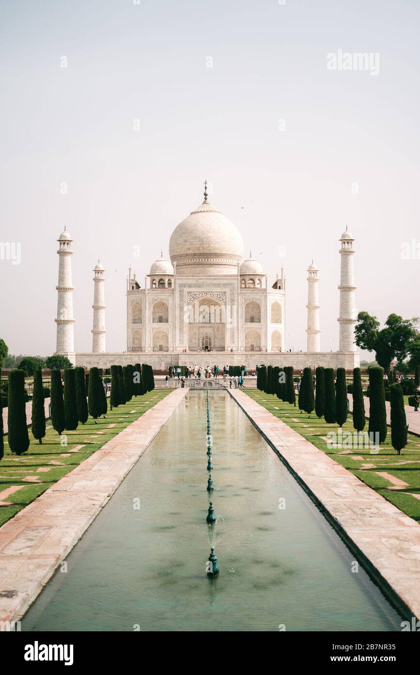 Taj Mahal, Agra in mid day with garden and fountain in front Stock