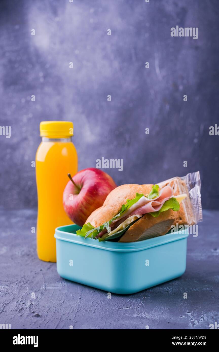 https://c8.alamy.com/comp/2B7NWD8/school-lunch-a-sandwich-with-salad-and-ham-juice-apple-healthy-nutrition-for-children-school-break-free-space-for-text-copy-space-2B7NWD8.jpg