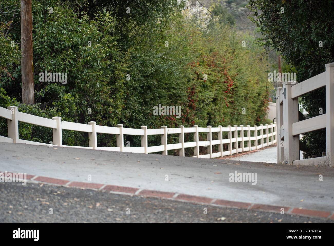 Fence Lined Driveway Stock Photo Alamy