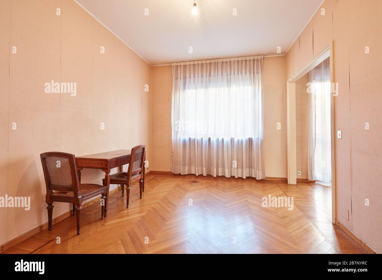 Room with parquet floor in apartment interior Stock Photo