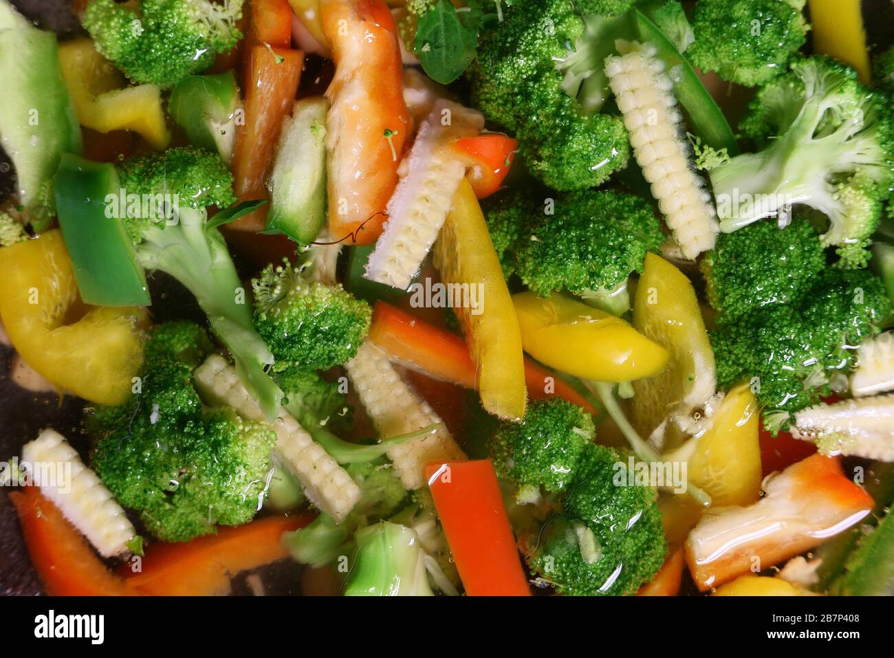 Healthy food. Greek salad with broccoli, tomato, sweet pepper, Stock Photo