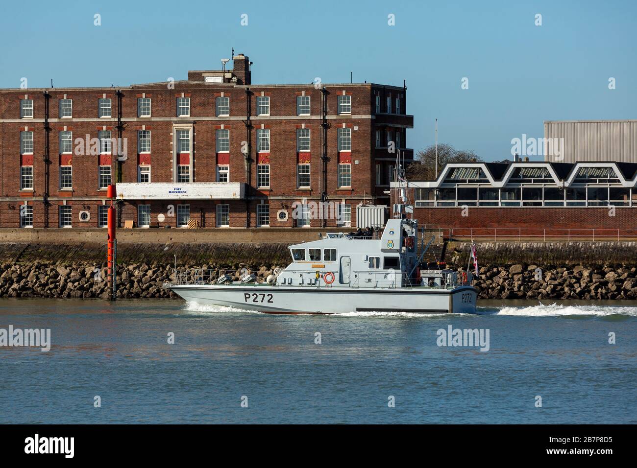 Patrol vessel P272 HMS Smiter leaving Portsmouth harbour at speed. Stock Photo