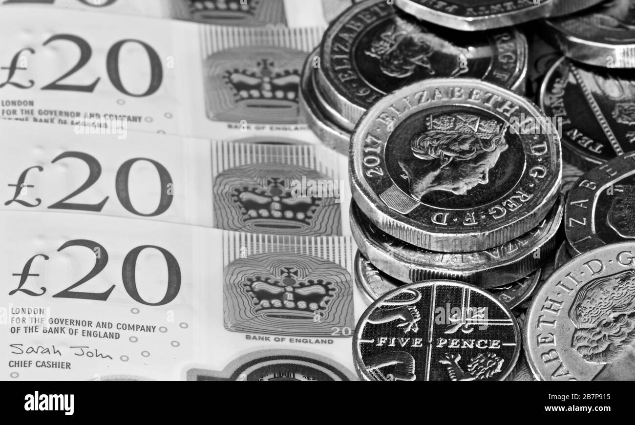 British coins on the new 2020 polymer £20 banknotes Stock Photo