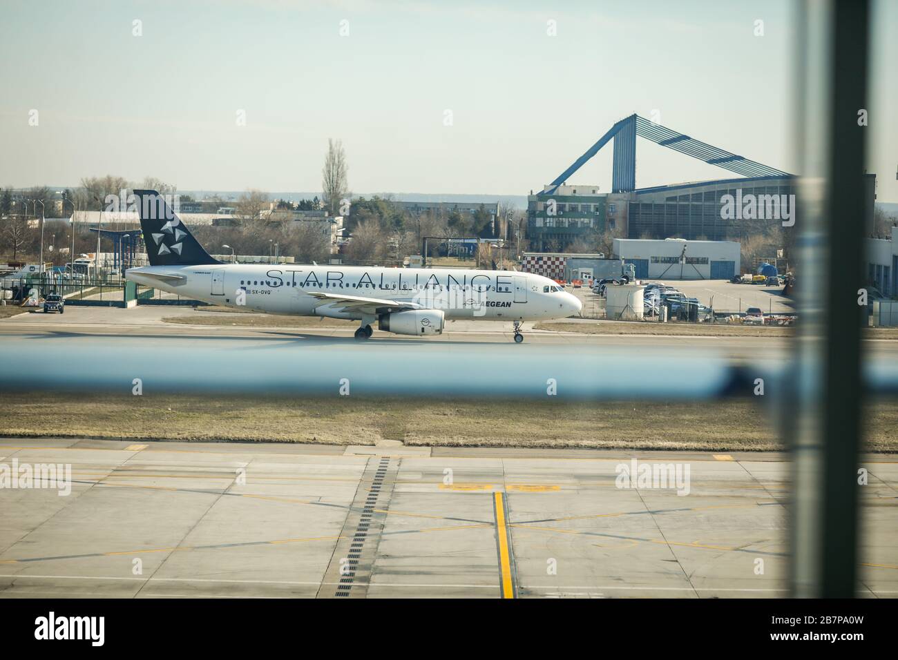 Otopeni, Romania - February 25, 2020: Aegean Airlines plane on Henri Coanda International Airport, near Bucharest, Romania. Stock Photo