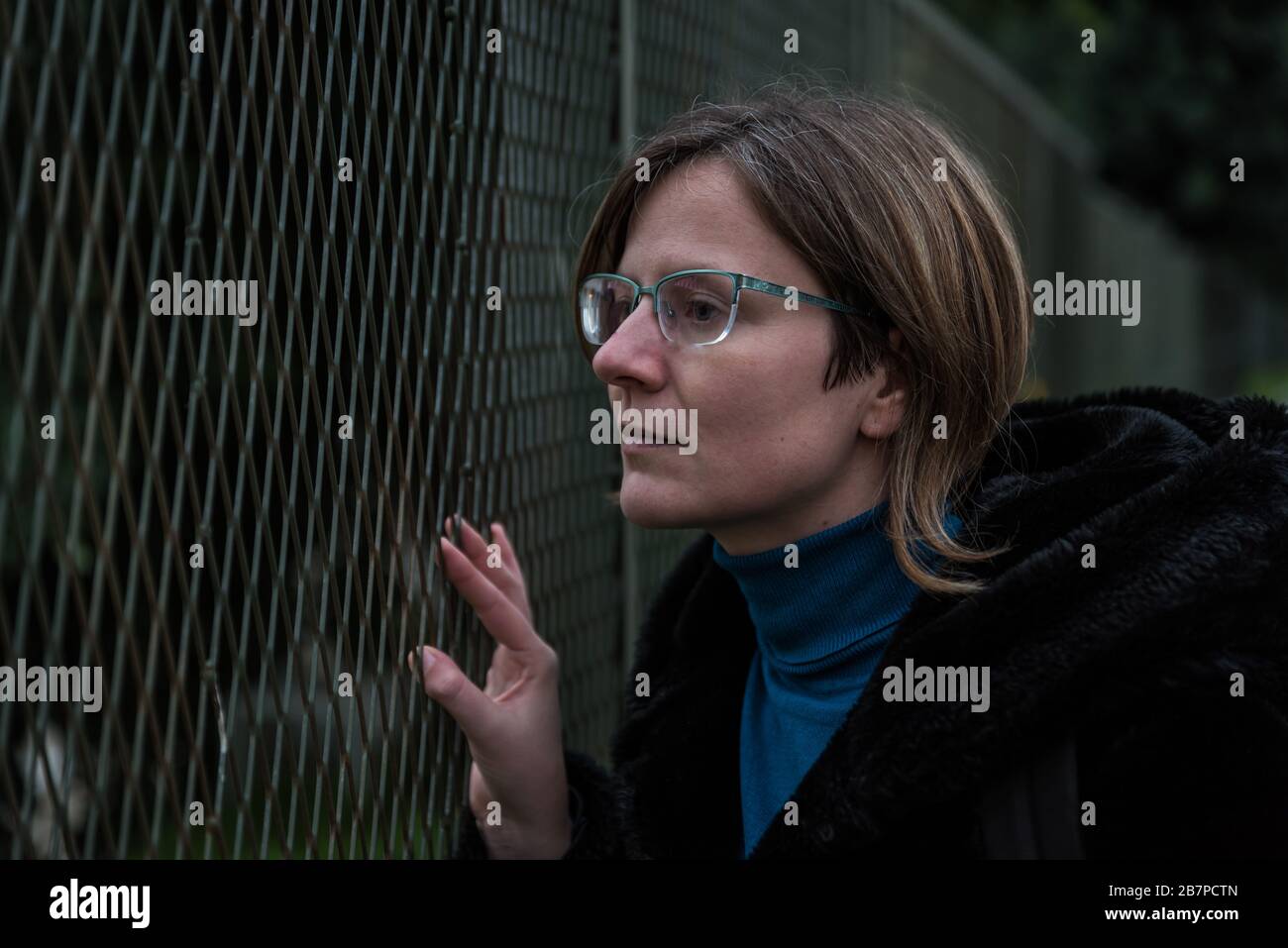 Portrait of a thirty year old attractive girl in a black winter coat Stock Photo