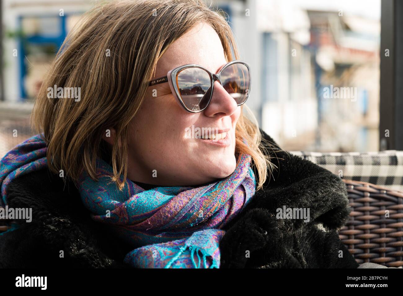 Portrait of a thirty year old attractive girl in a black winter coat Stock Photo