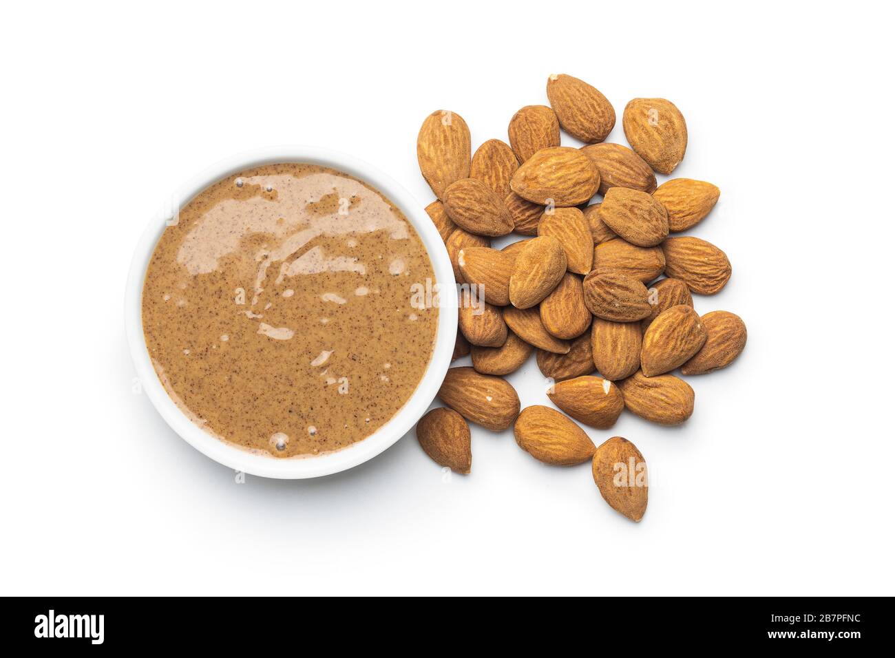 Almond spread. Almonds and butter isolated on white background Stock