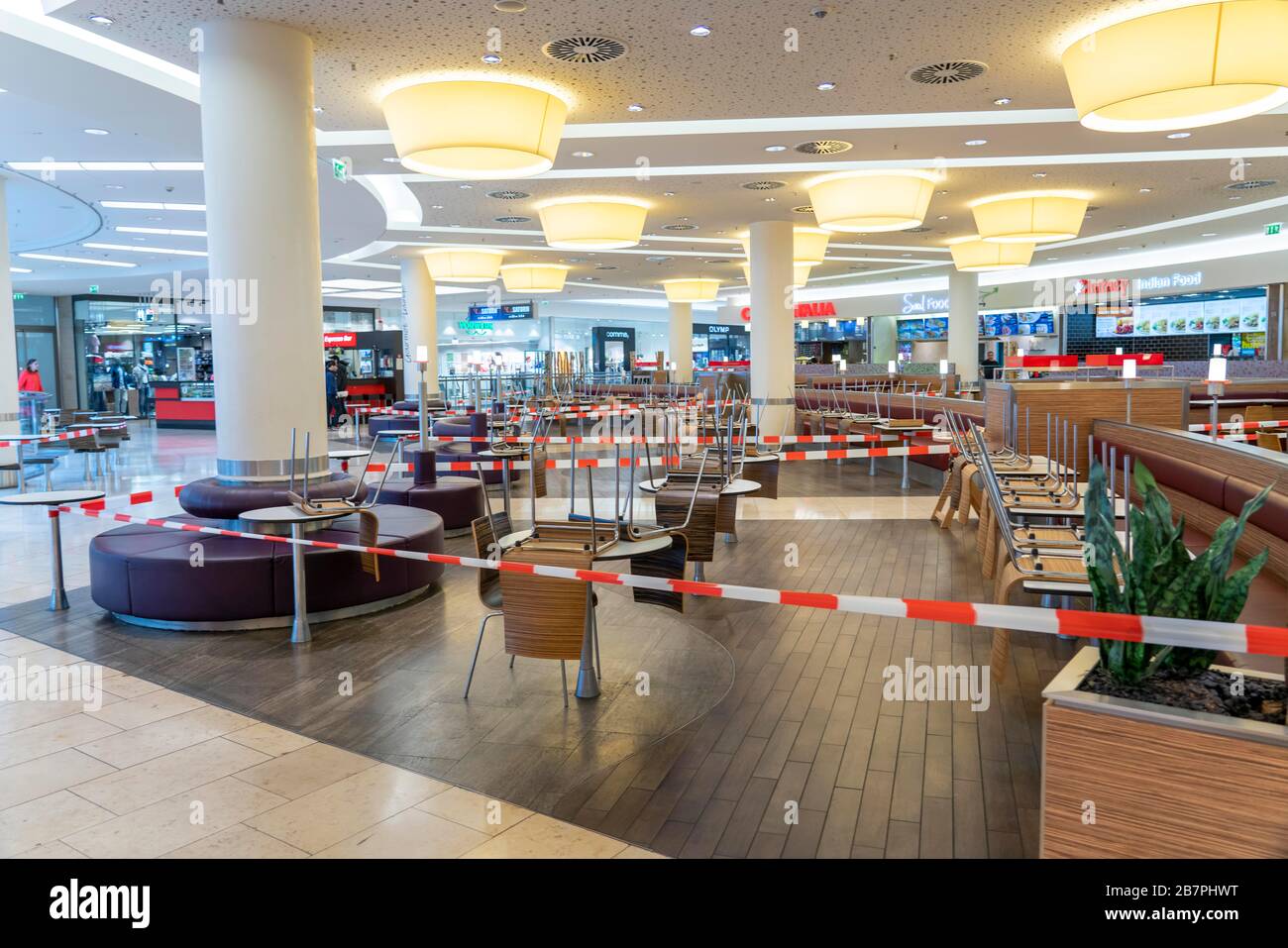 Effects of the coronavirus pandemic in Germany, Essen, Limbecker Platz shopping centre, cordoned-off areas, seating, dining tables for fast food resta Stock Photo