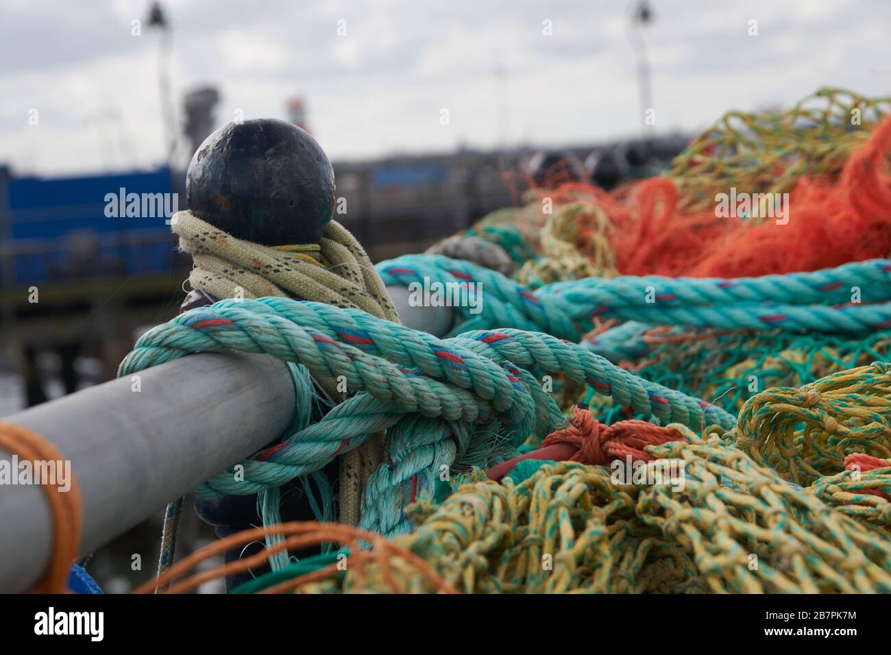 Pier with fishing boats and nets hires stock photography and images