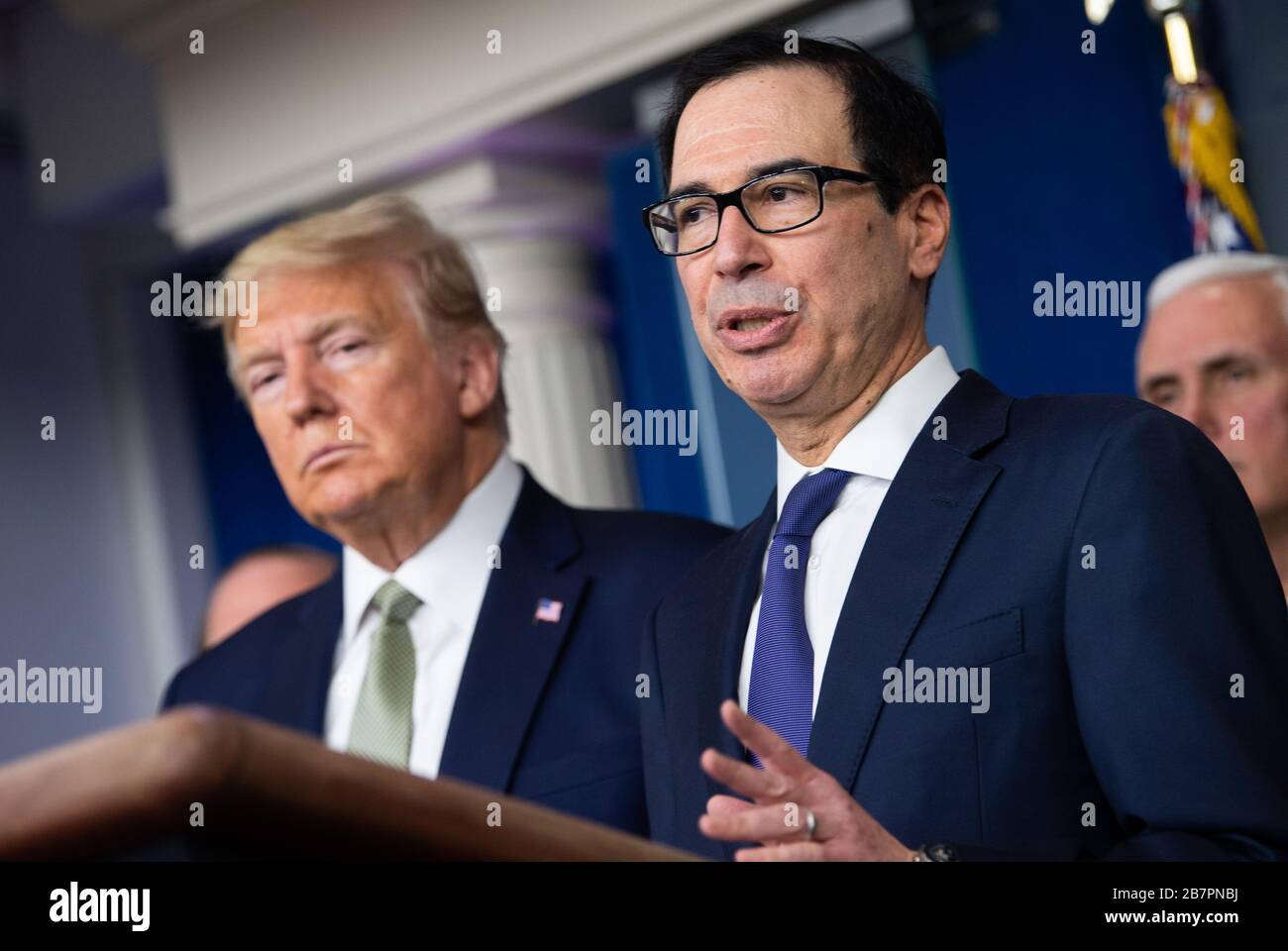 United States Secretary of the Treasury Steven T. Mnuchin delivers remarks alongside US President Donald J. rump during a briefing on the Coronavirus COVID-19 pandemic in the Brady Press Briefing Room at the White House in Washington, DC, March 17, 2020, in Washington, D.C. Credit: Kevin Dietsch / Pool via CNP | usage worldwide Stock Photo