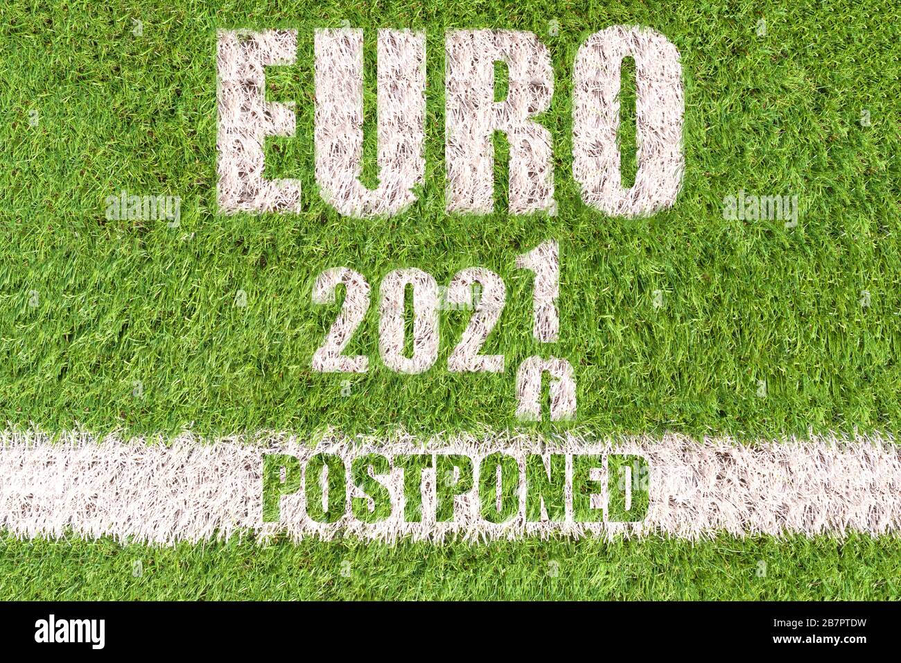 Euro 2020 postponed concept: text that announce that the european soccer tournamente will be postponed to 2021 due to the coronavirus crisis written o Stock Photo