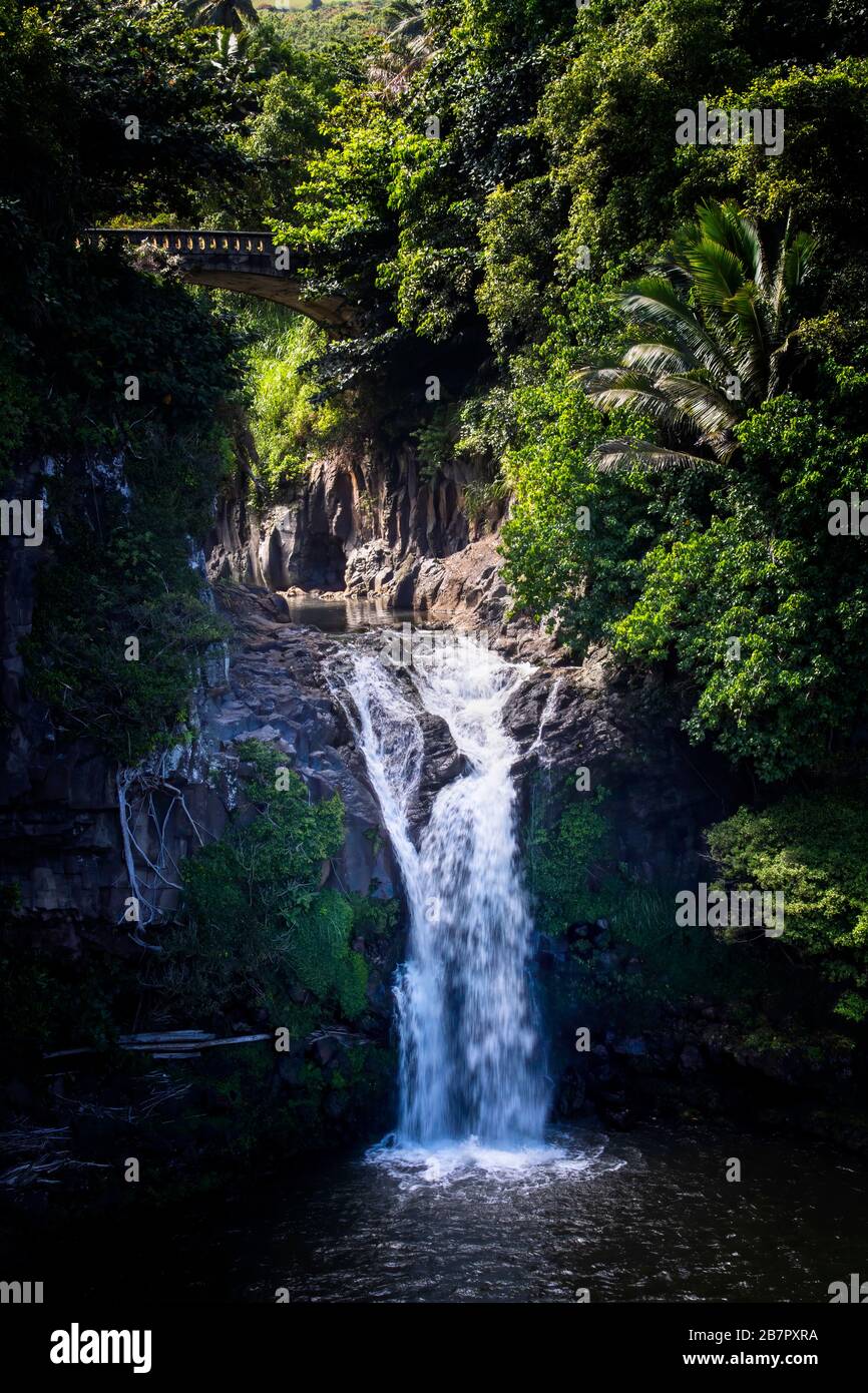 Waterfall pours below bridge at Oheo Gulch in Haleakala National Park on Maui, Hawaii. Stock Photo