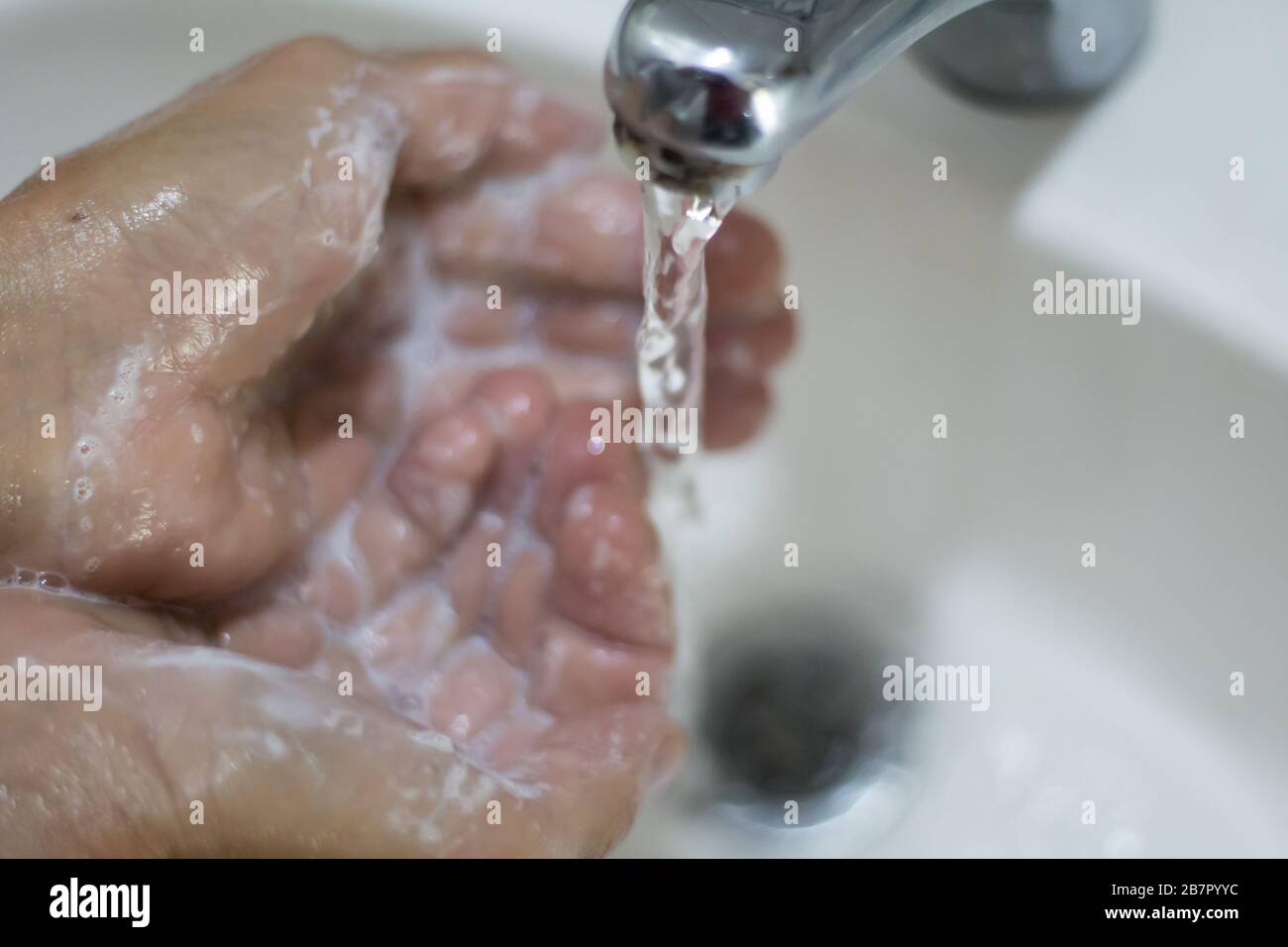 woman's hands washing with soap and water Stock Photo Alamy