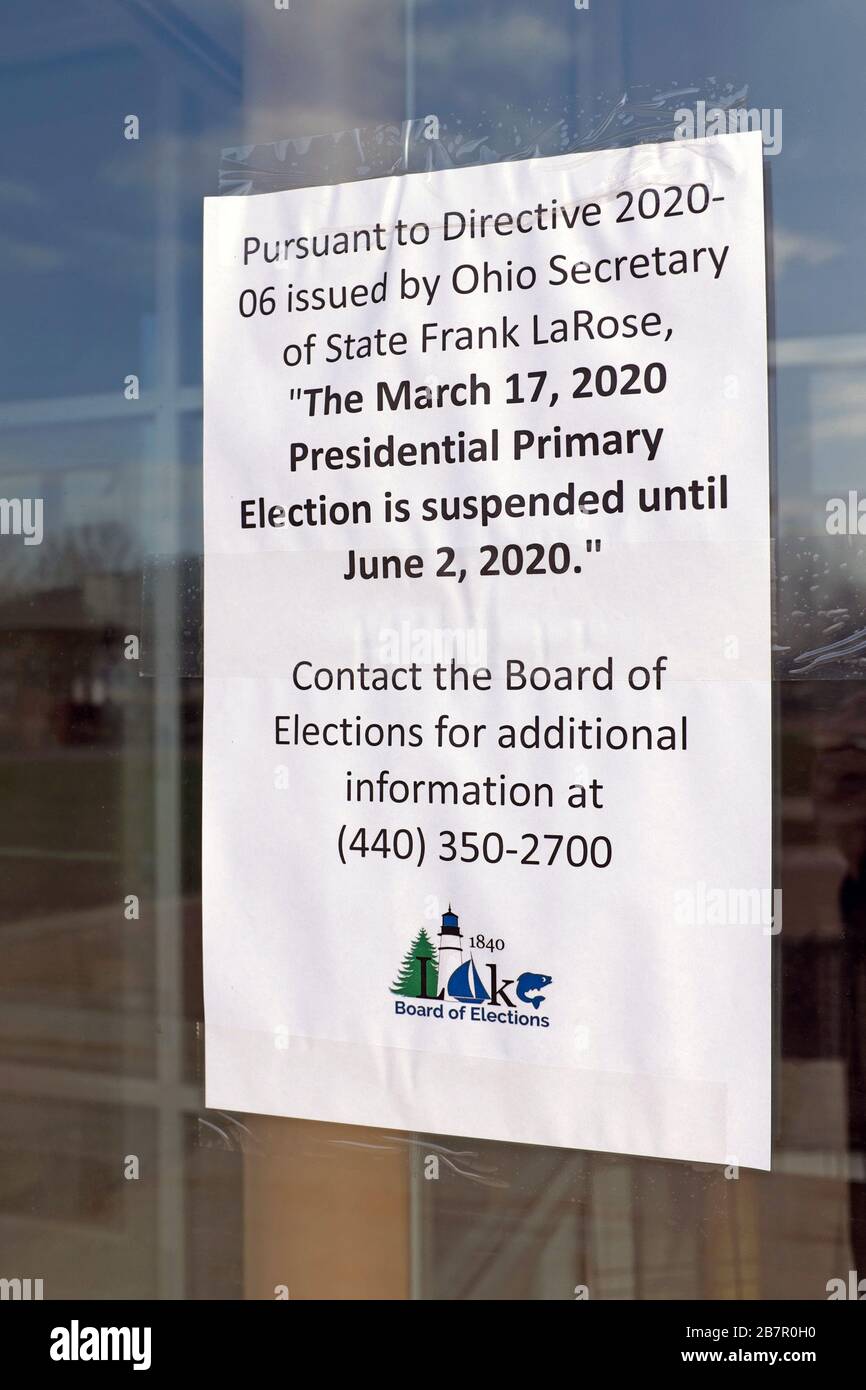 The sign at a polling place indicates the March 17, 2020 Ohio Presidential Primary is suspended until June 2, 2020 due to the coronavirus outbreak. The signage is on the door at the Richard Bonde Recreation Center, a polling location in Willowick, Ohio, USA. Stock Photo