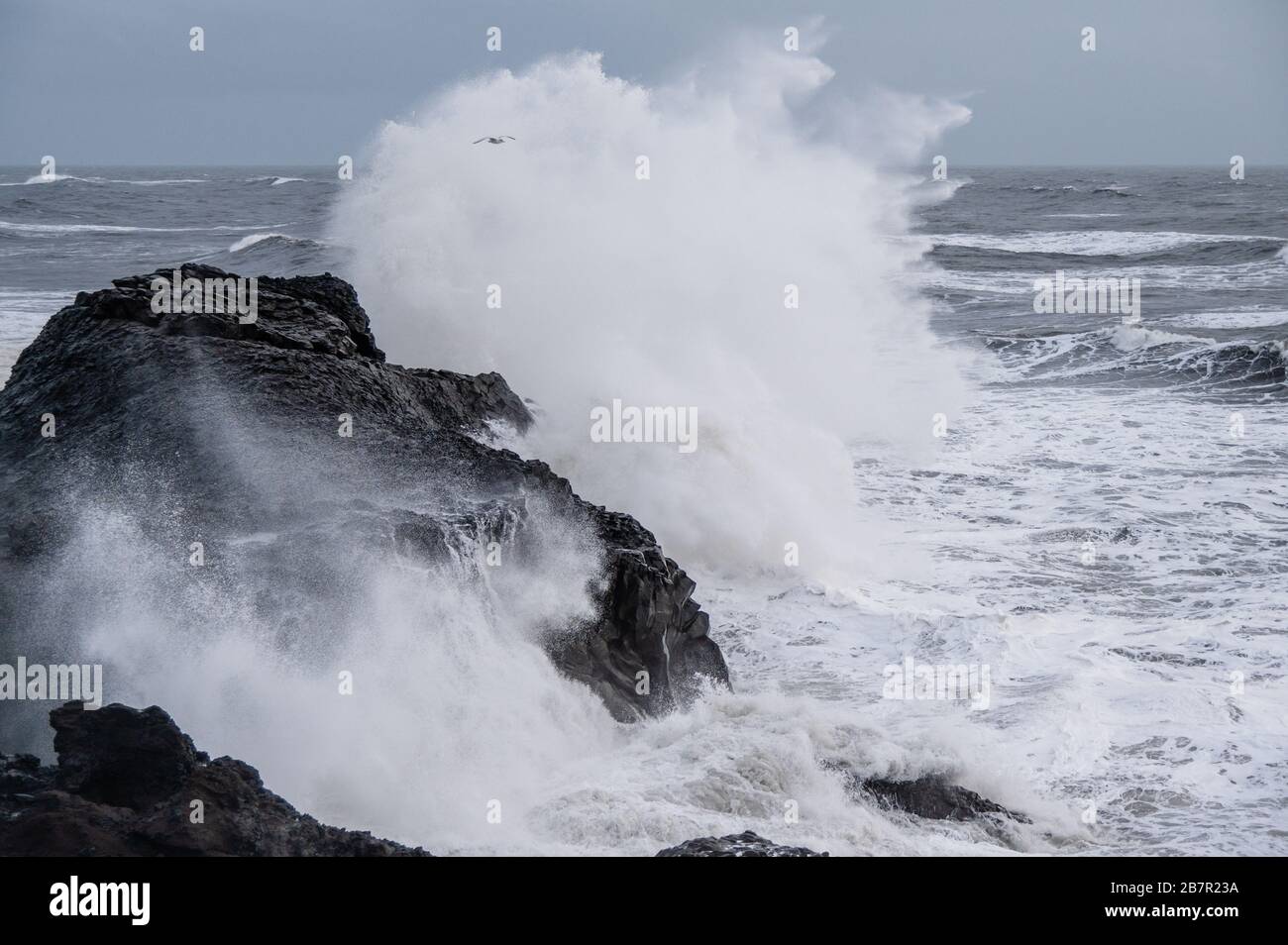 Waves Hitting Shore Stock Photo