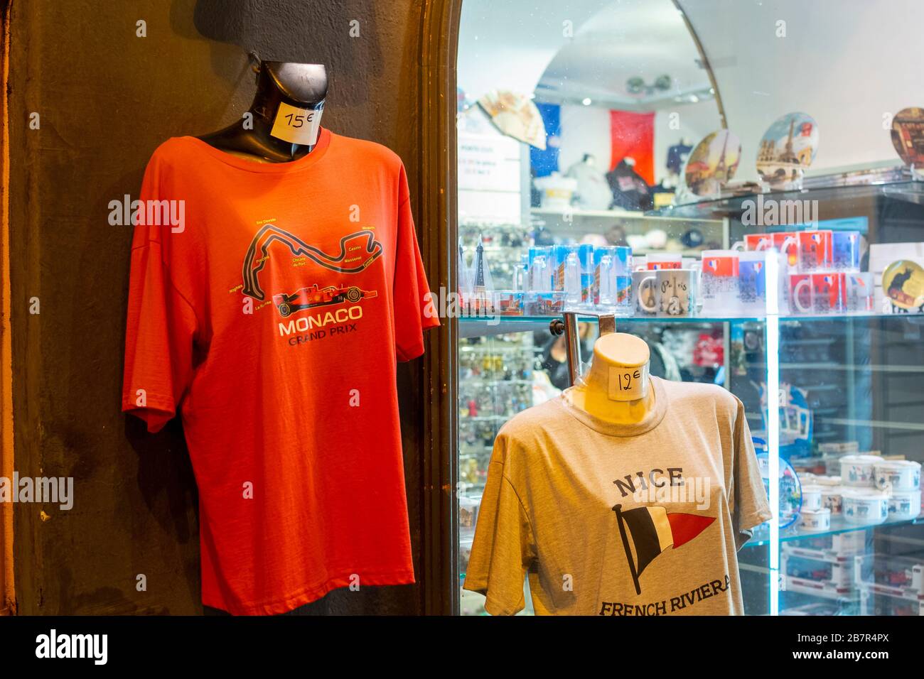 T-shirts on mannequins advertise the French Riviera and the Formula One Monaco Grand Prix outside a souvenir shop in Nice, France. Stock Photo