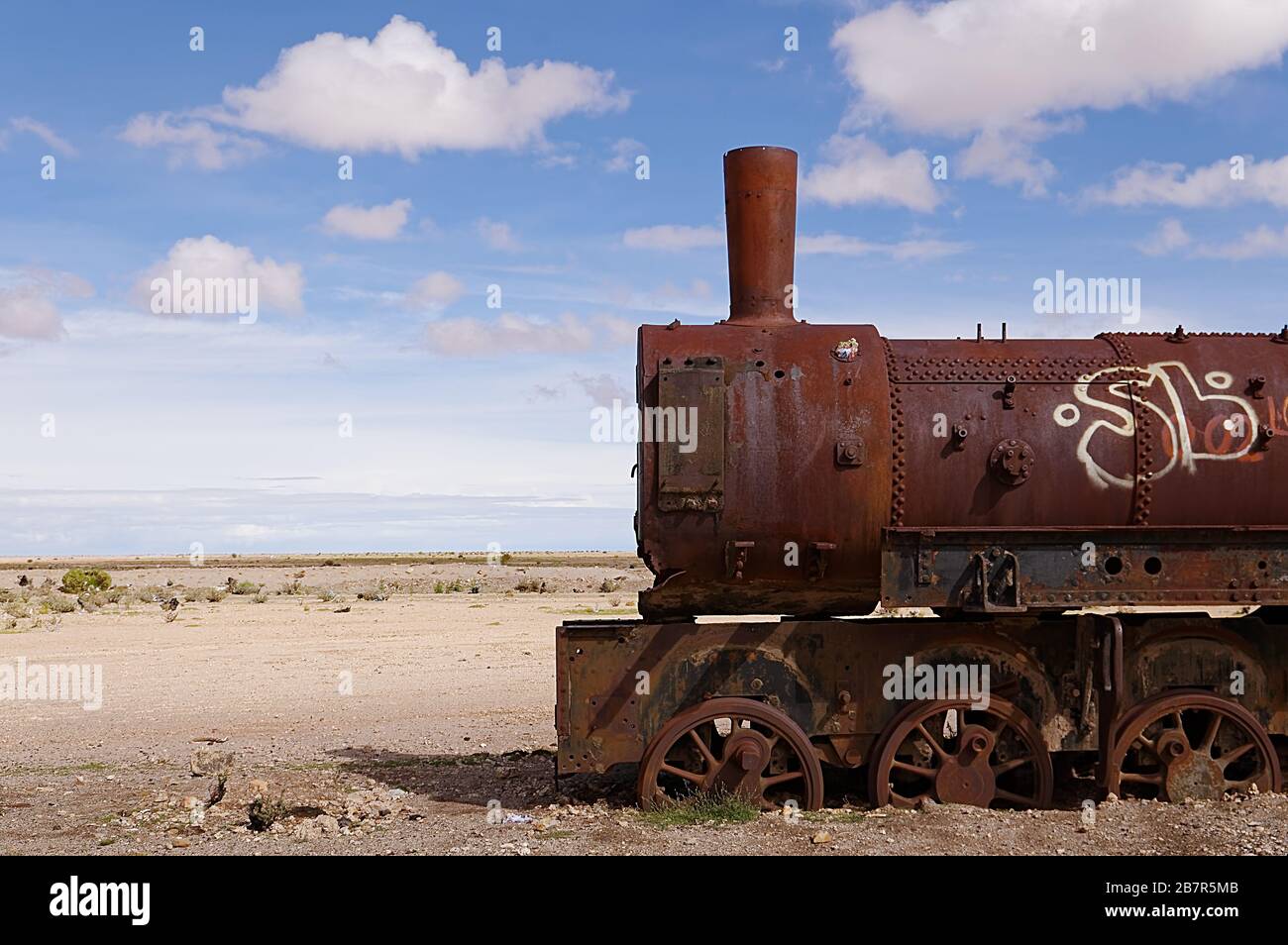 Train Cemetery is a rusty collection of historic steam locomotives dating back to the 19th century, when there was a rail-car factory at Uyuni. Stock Photo