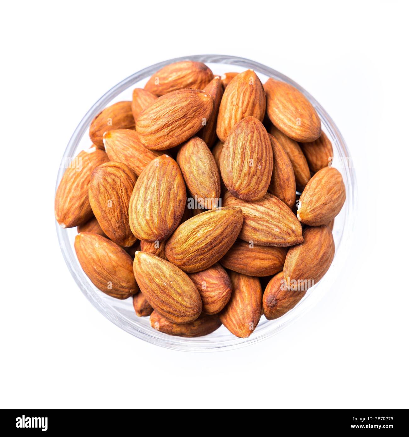 A cup of almonds isolated on white Stock Photo