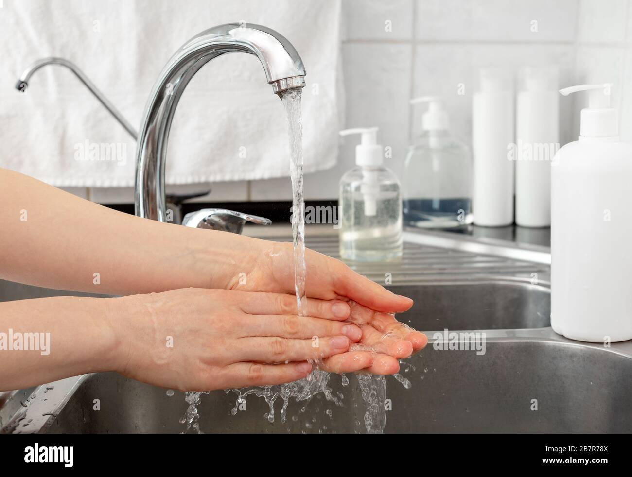 Woman washing hands with antibacterial soap and water. Hygiene concept ...