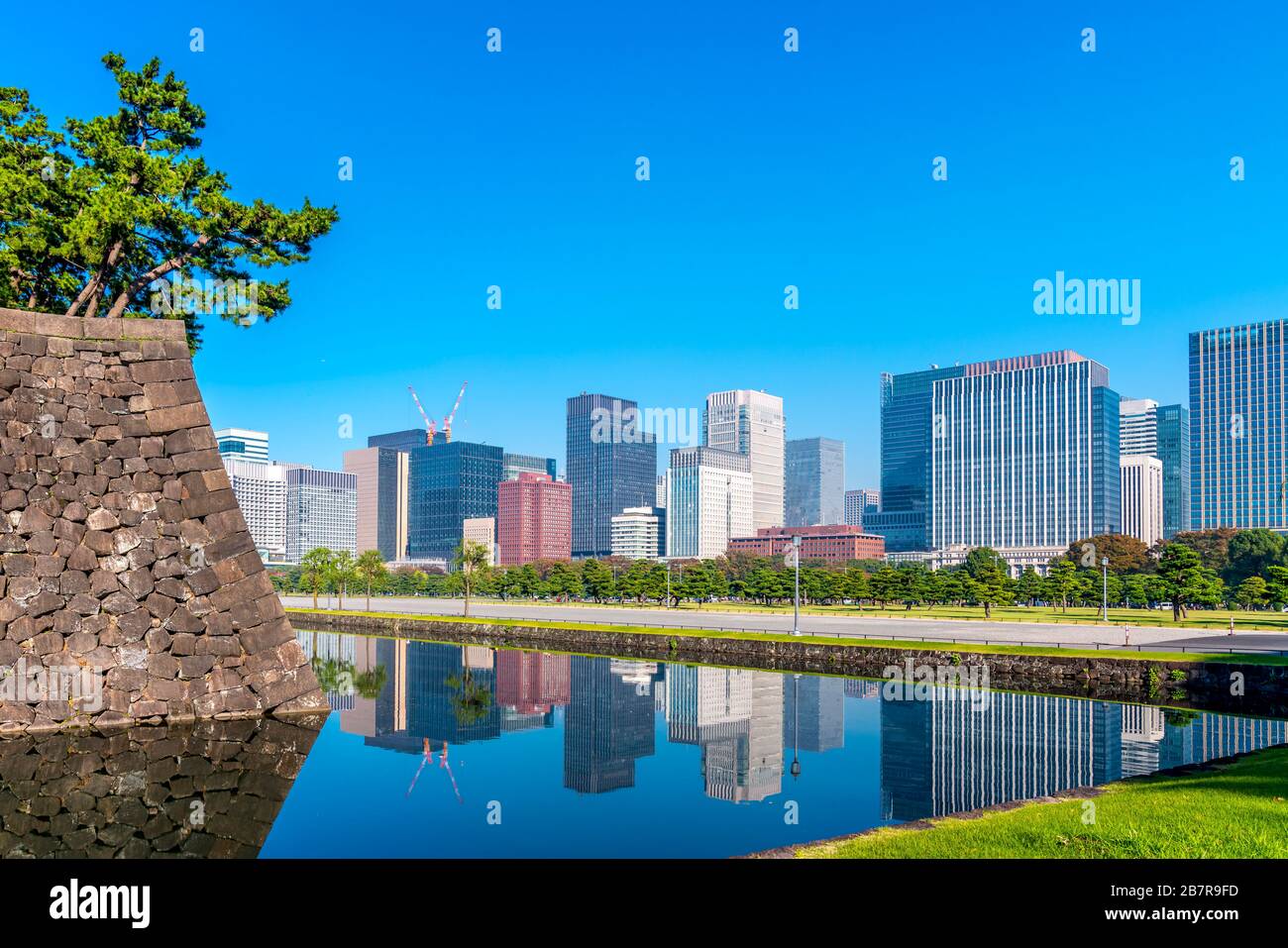 corner of the imperial palace with mordern buildings, Japan Stock Photo